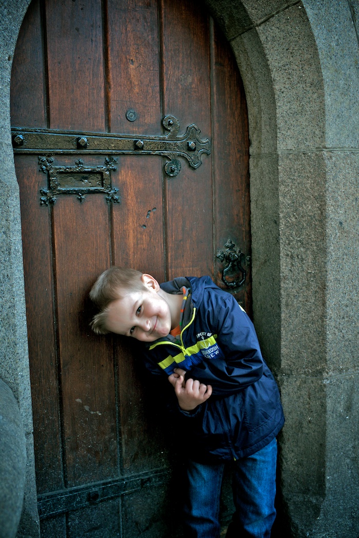 Evan is such a goof when posing. Also, cool door.