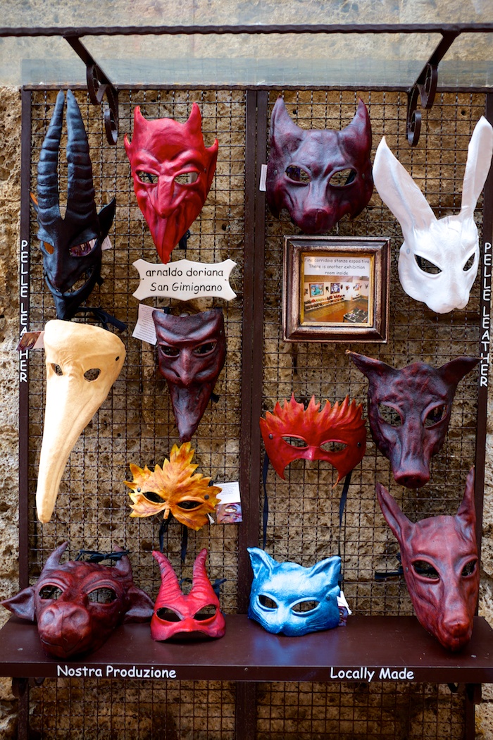 Creepy Italian masquerade masks. Also, Comic Sans. Boo.