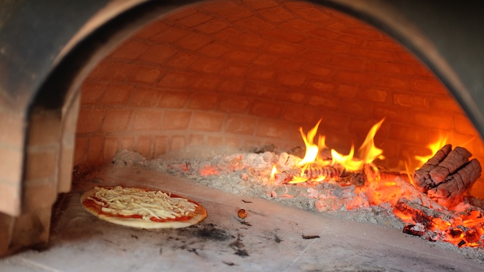 Into the wood fire oven!